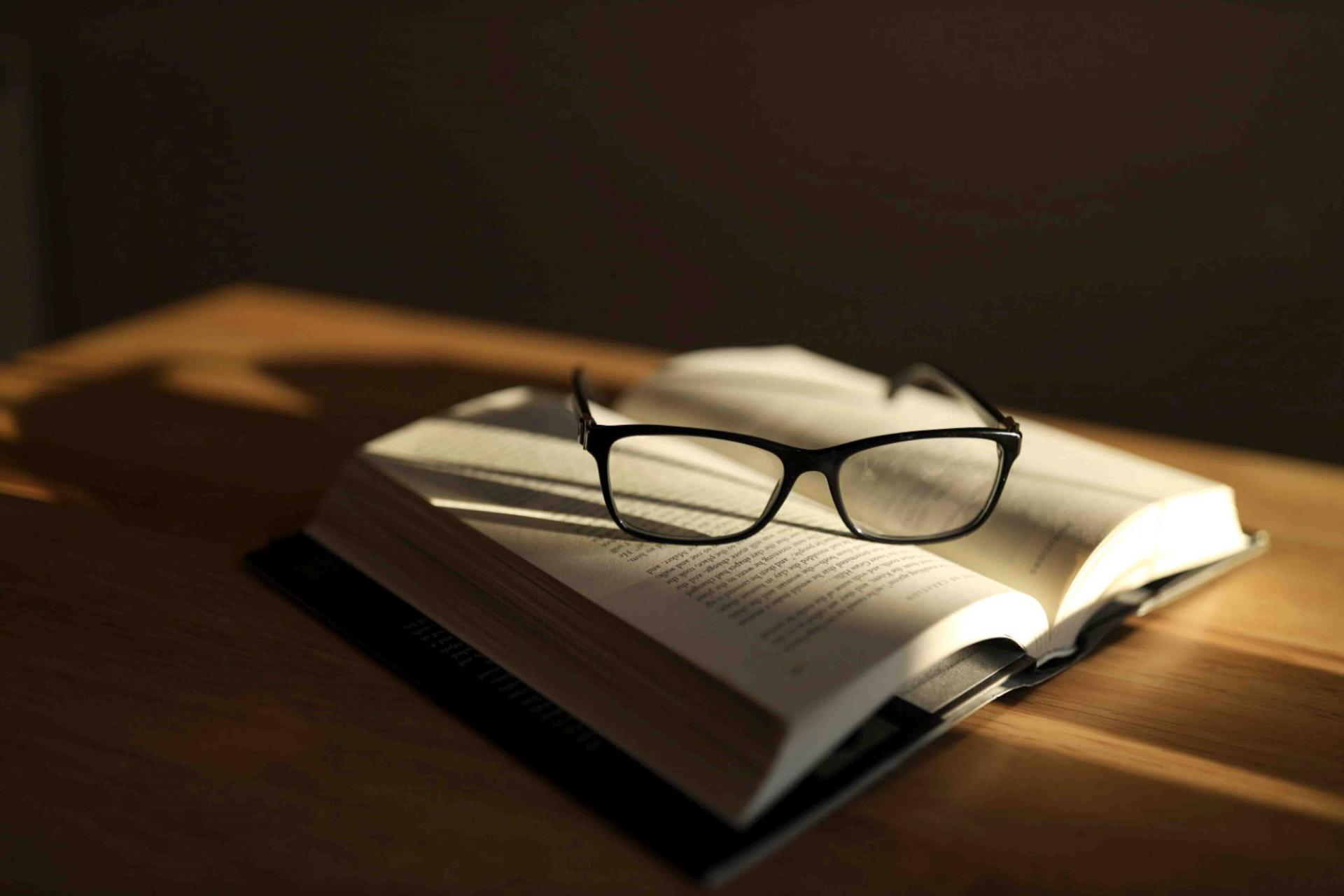 Glasses on book