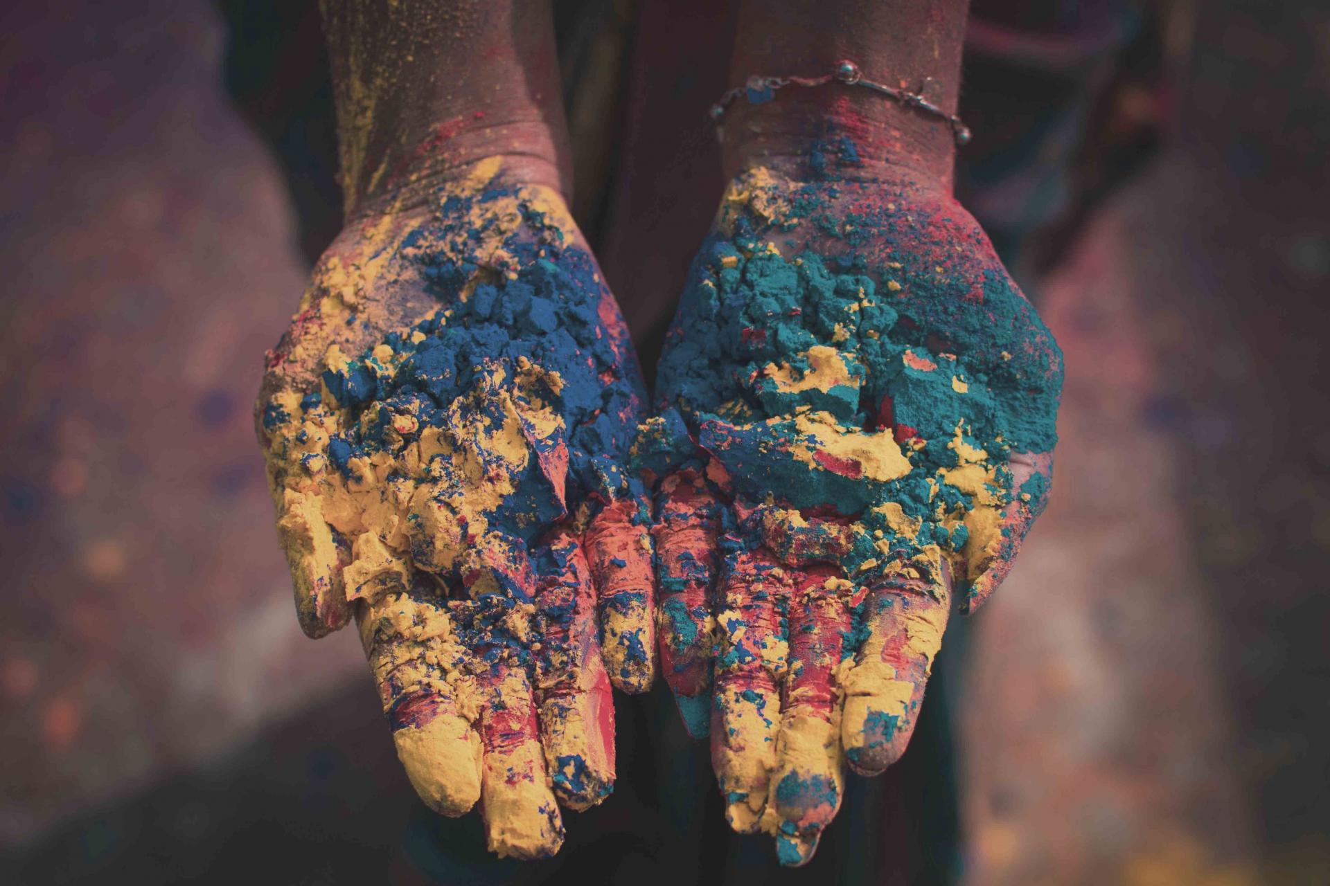 Hands with powdered paint