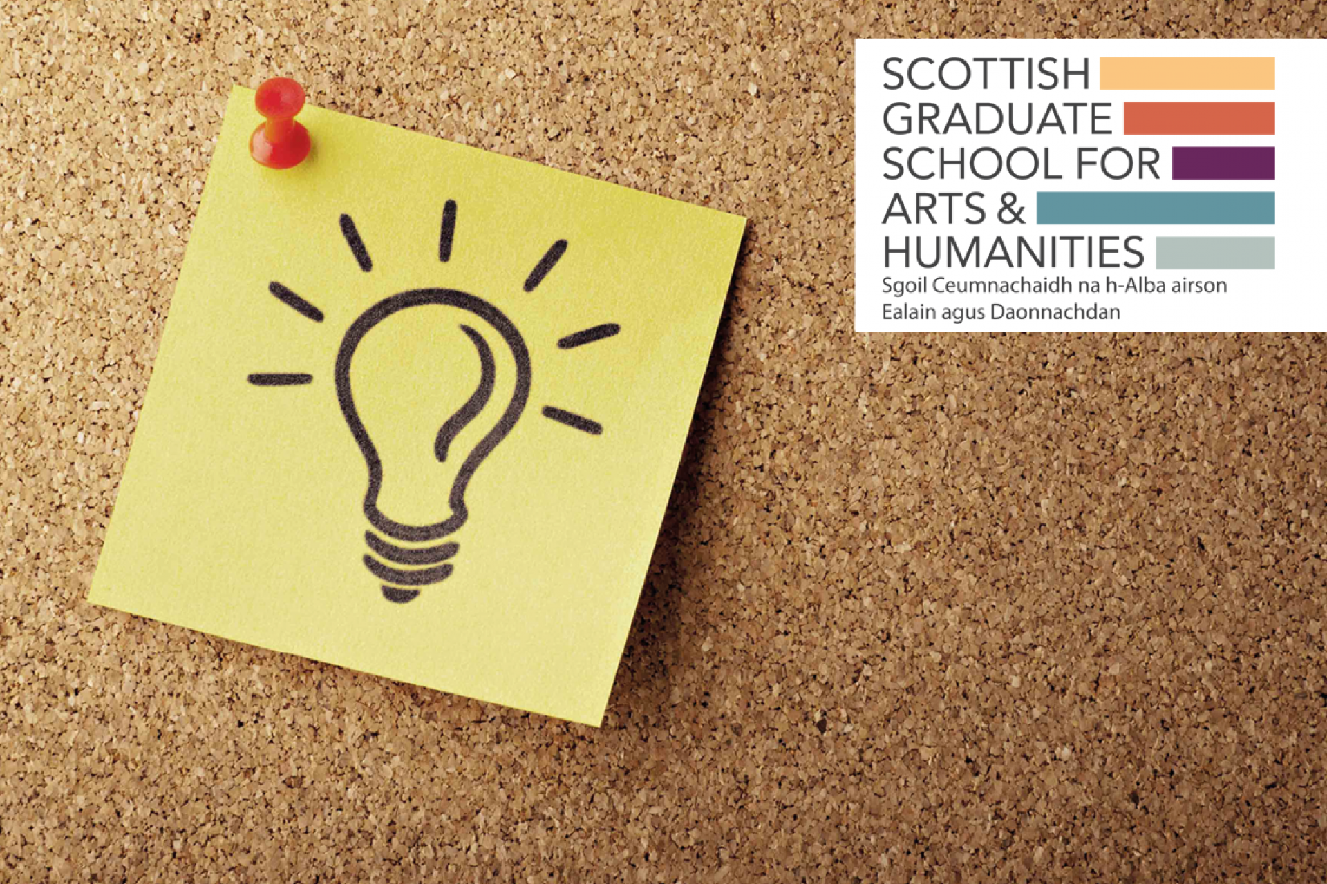 postit with lightbulb on cork board