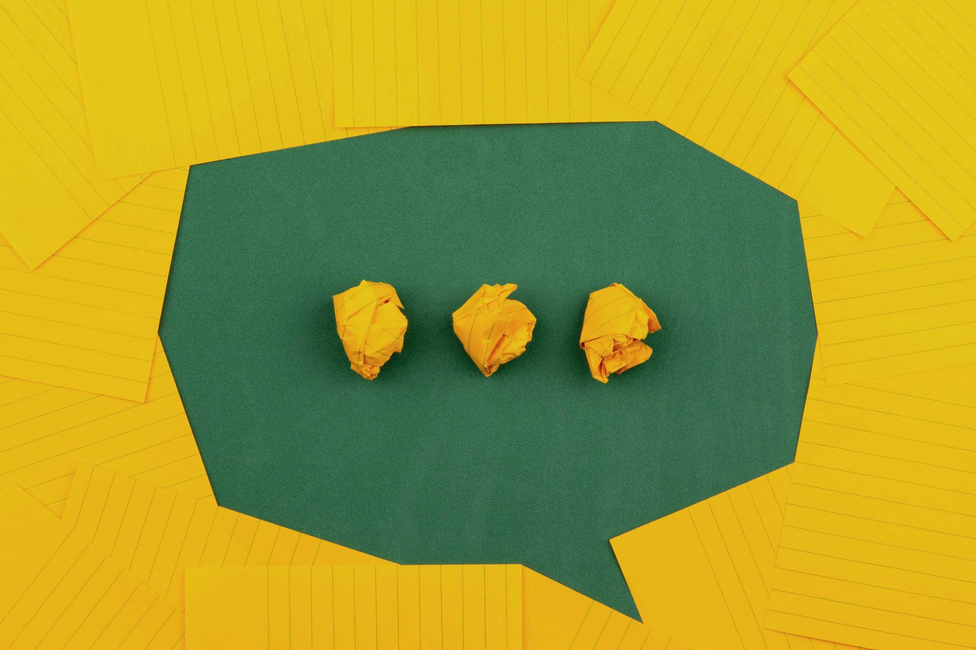 Speech bubble made out of yellow post-its