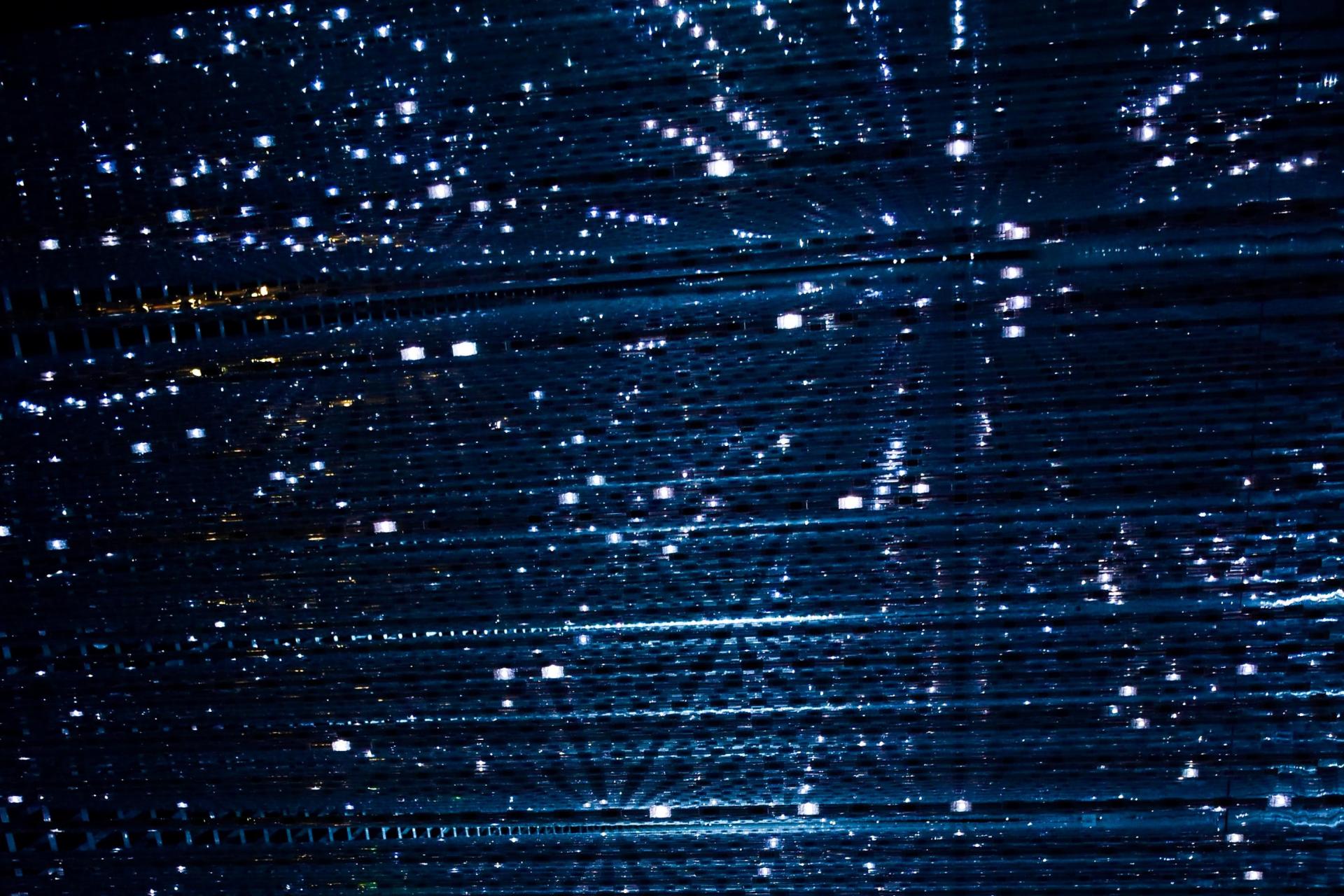 Blue lights on black background