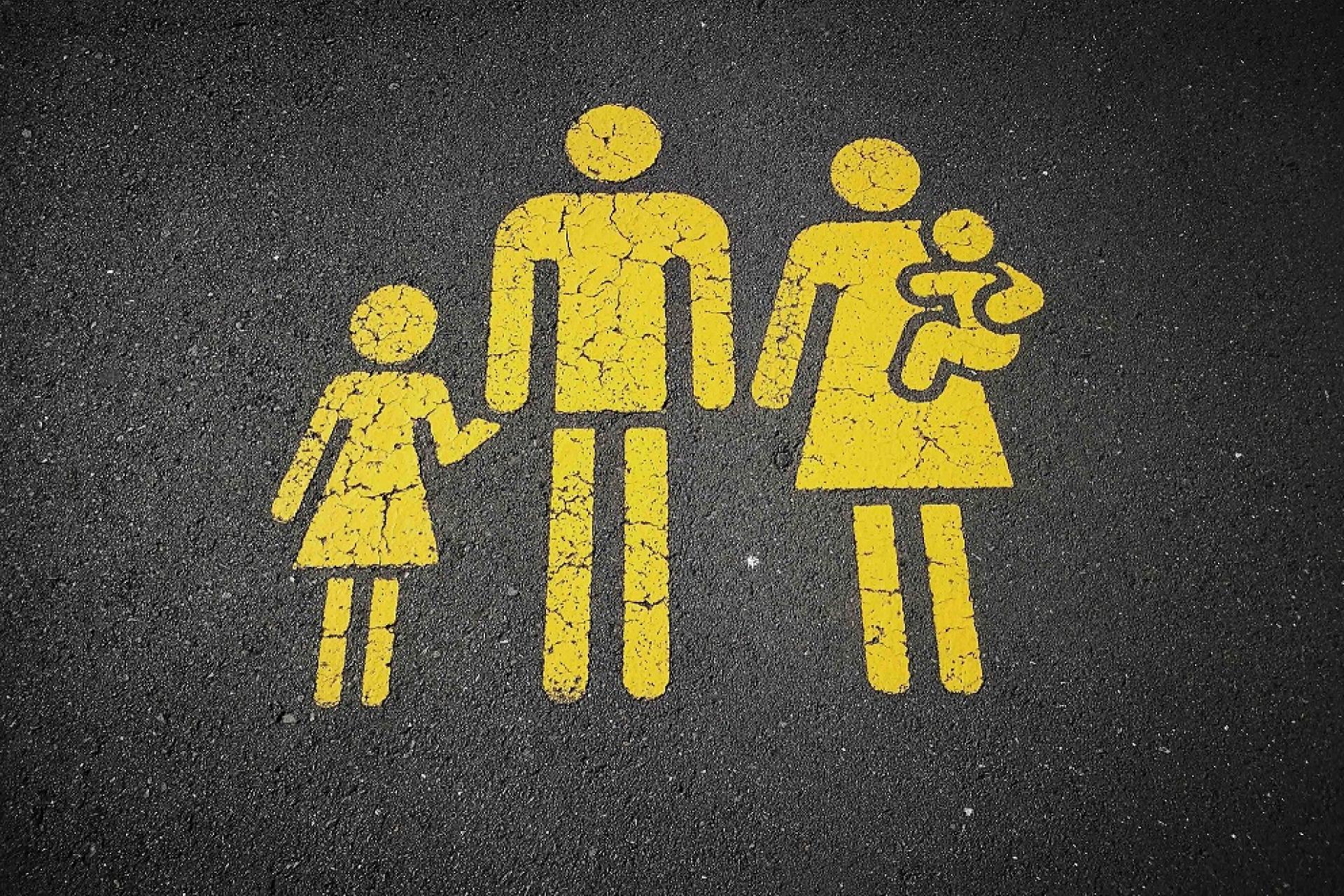 Stencil of family on ground