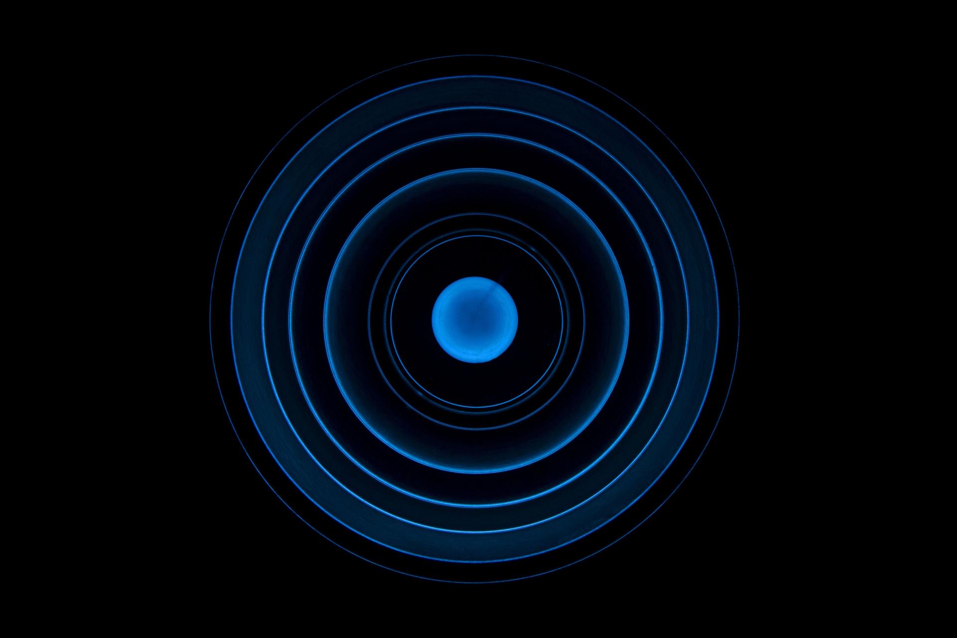 blue circles on black background