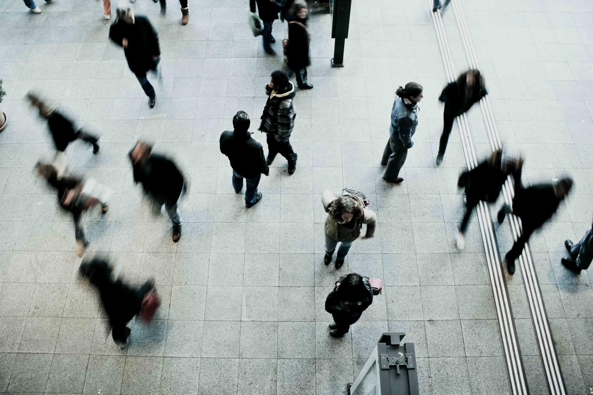 People walking on grey floor