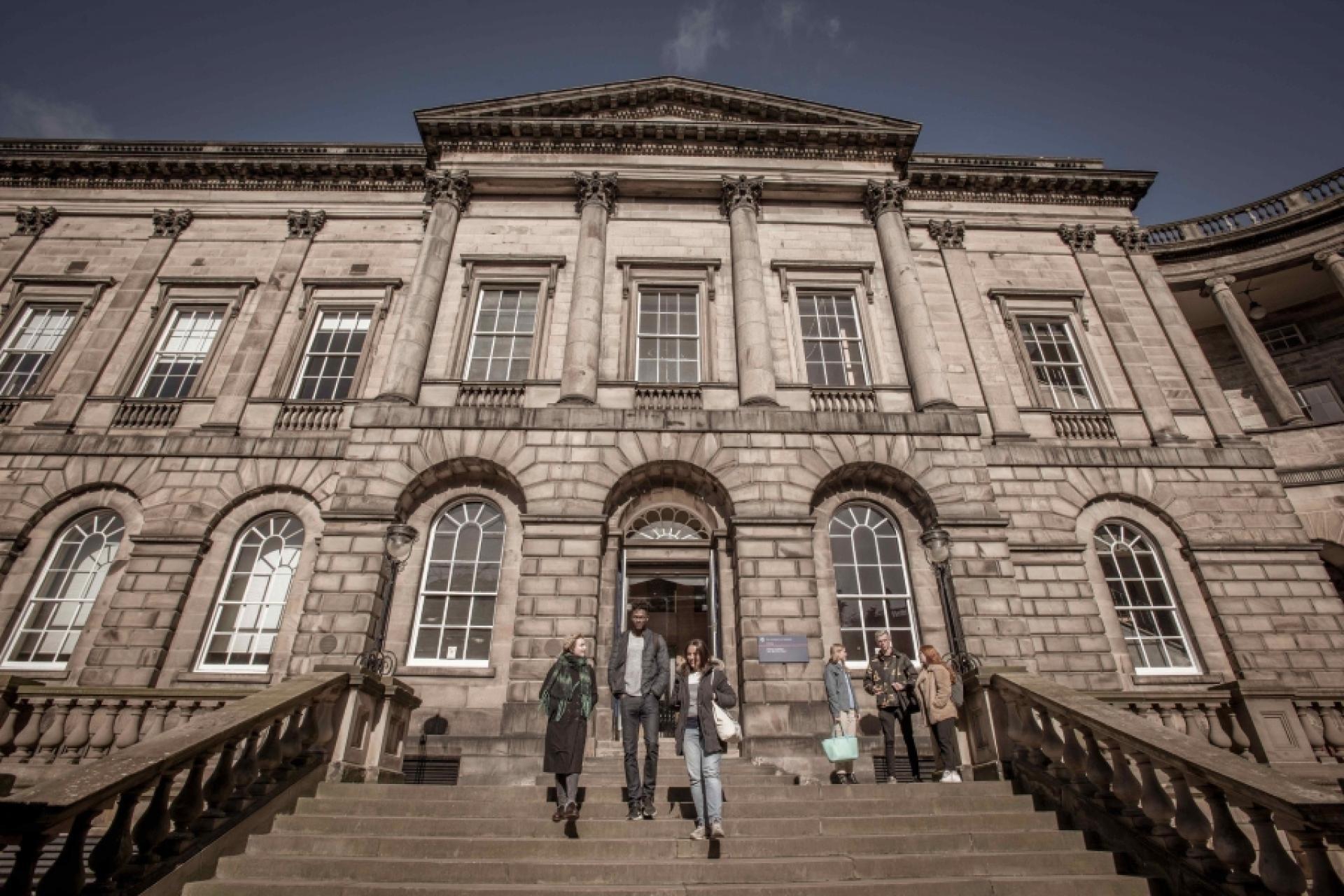 Students outside of Edinburgh Law School entrance