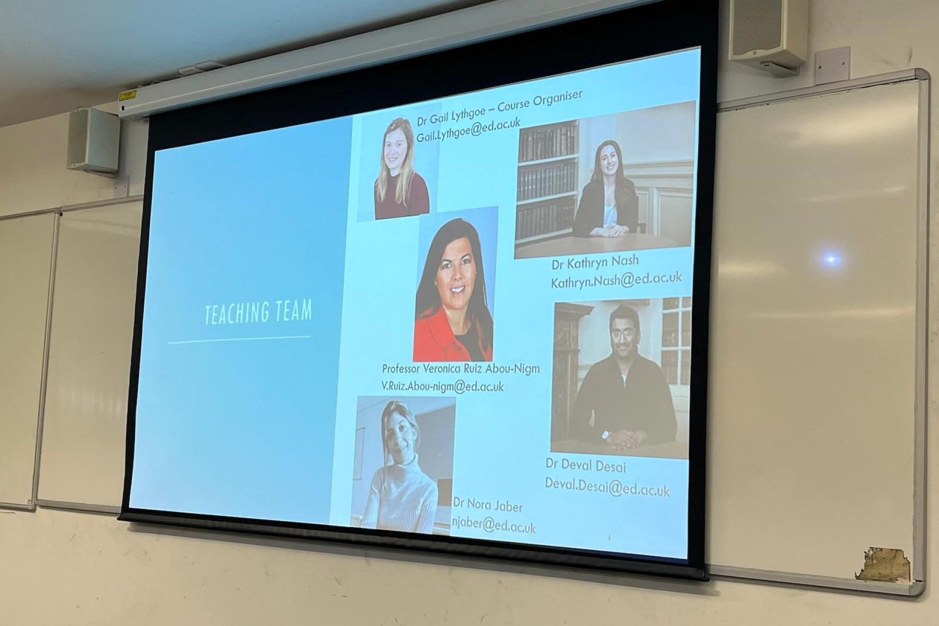 a screen showing the global law team