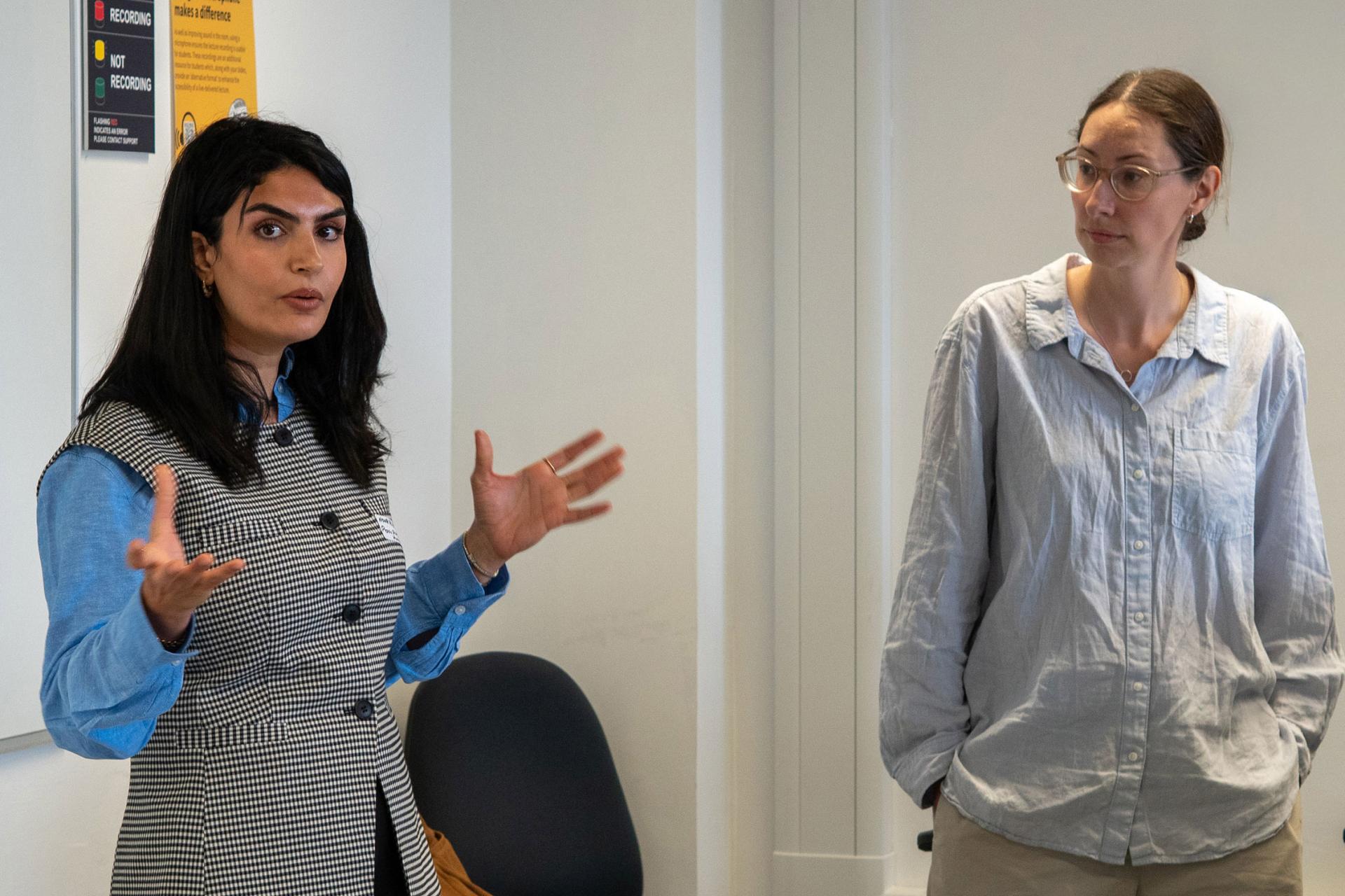 Noor Al-Naser and Laura Wise presenting