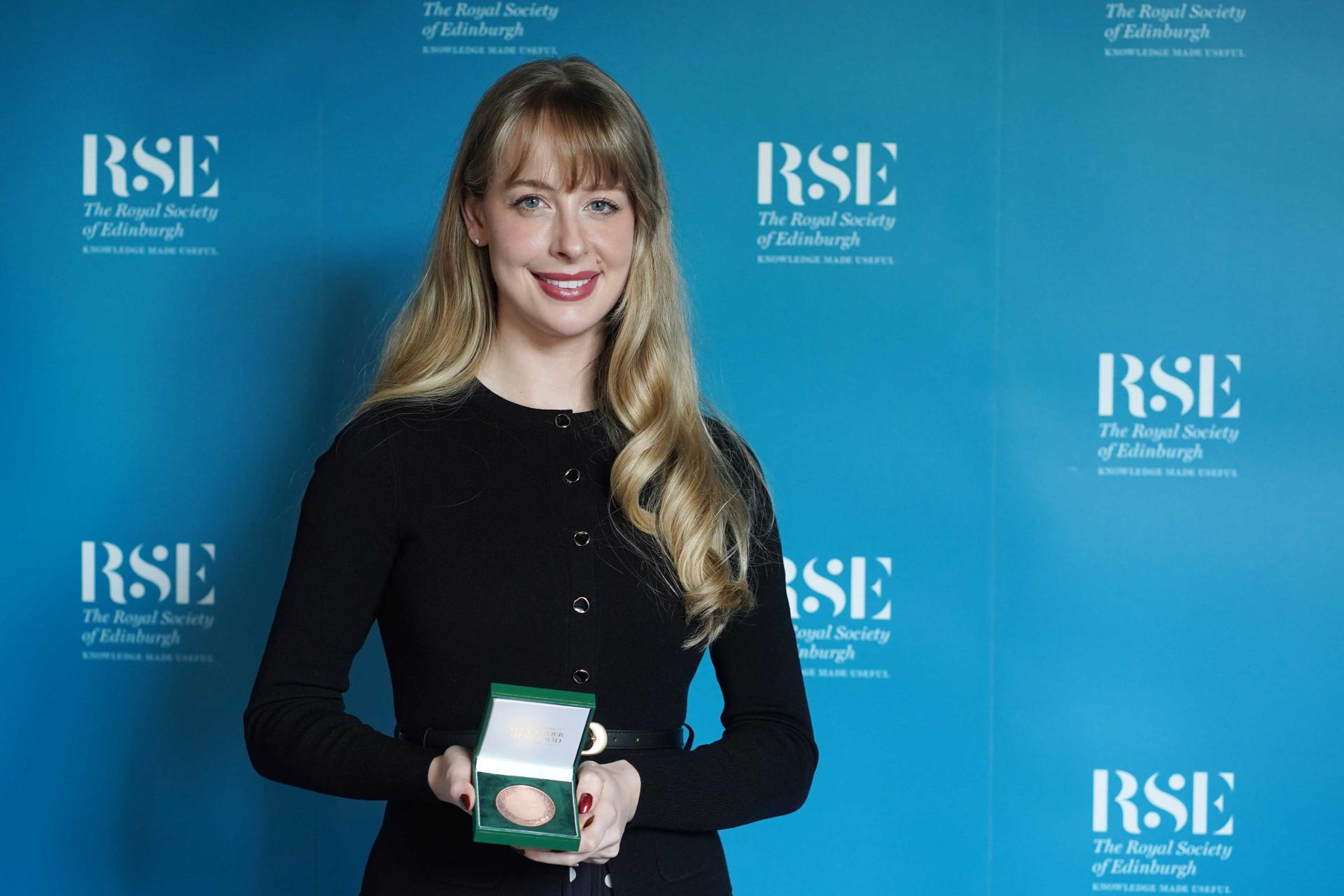 Dr McMillan hold the RSE medal